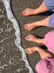 Bare feet on a beach