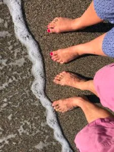 Bare feet on a beach